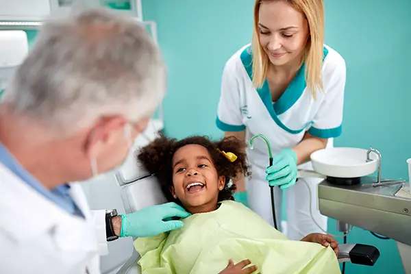 Smiling image of a kid after being treated for a dental emergency, at Portland Emergency Dentist in Portland, OR.